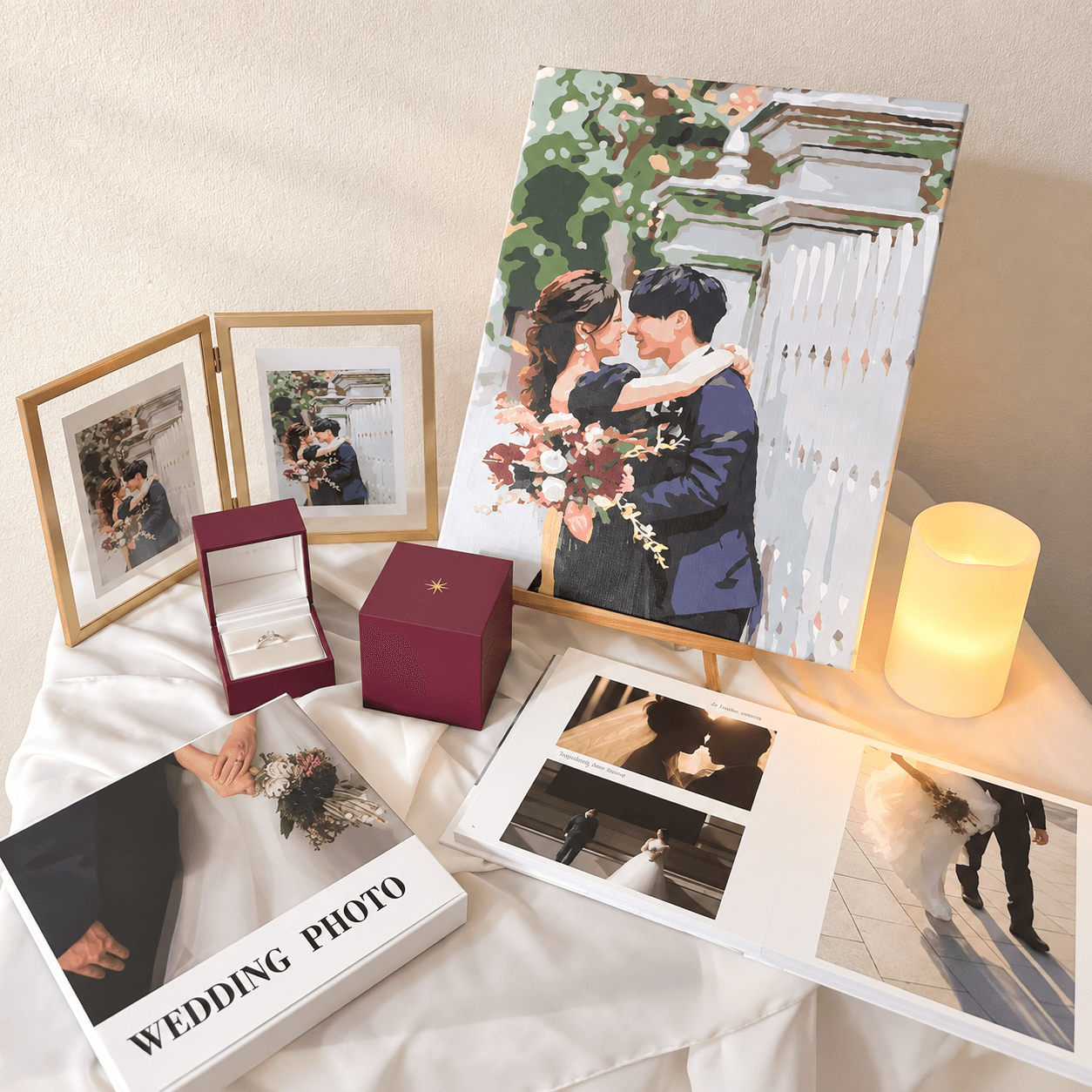 キャンドルやアルバムと結婚写真の完成作品を組み合わせた飾り方